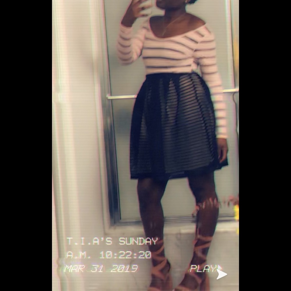 Pink heel with black puff skirt